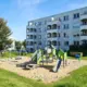 Legeplads foran Grøfthøjparkens etagebyggeri i Viby